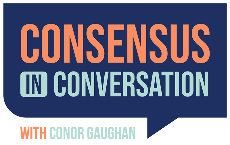 Consensus in Conversation Logo - Dark blue comment bubble with orange and aqua sans-serif type inside